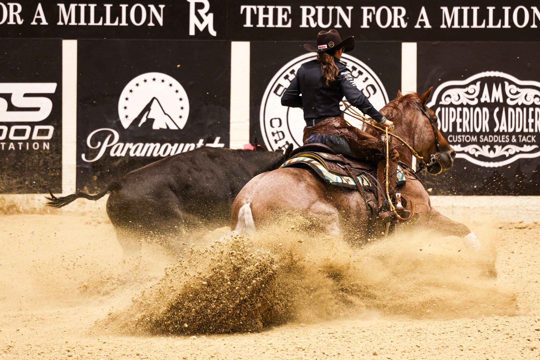 Erin Taormino winning the 2026 Run For A Million Cow Horse Challenge aboard Hazardouz Material